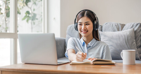 Asian girl student online learning class study online video call zoom teacher, Happy asian girl learn english language online with computer laptop..