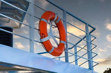 Life buoy on the deck of cruise ship.S ecurity life kit on ship's deck