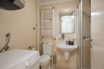 Fototapeta na wymiar Interior of a bathroom in rental apartment