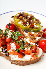 Toasts with tasty grilled vegetables, concept of delicious appetizer