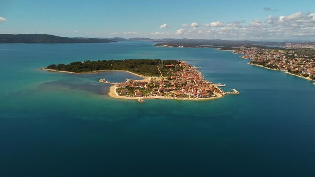 4K slow arc shot of the island of Krapanj, Croatia.