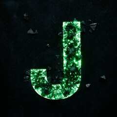 High quality photo of green colored capital letter J on a black textured background with black...