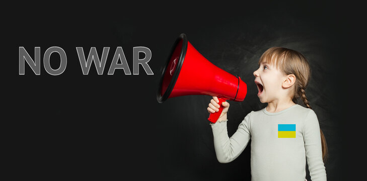 Little child girl screaming through a megaphone No War in Ukraine