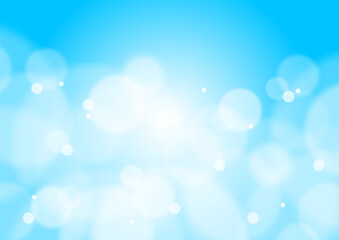 玉ボケがキラキラ光る背景イメージ（水色・青）