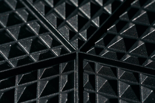 Close up edges and detail of cast iron waffle iron
