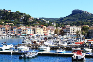 Fototapeta na wymiar beautiful coastline view port and houses mountains Casis, France, Cote Dazur, French Riviera