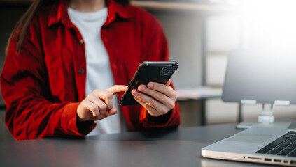 businesswoman hand working with new modern computer using on smartphone and tablet as concept..