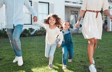 Family, holding hands and kids running with their parents outdoor in the garden of their home together. Children, fun and daughter siblings playing with their mother and father outside in the yard
