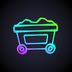 Glowing neon line Mine cart with gold icon isolated on black background. Vector