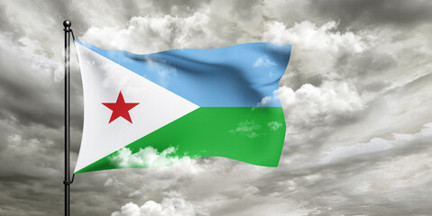 Djibouti national flag cloth fabric waving on beautiful sky grey Background.