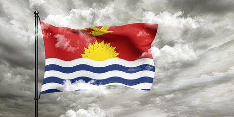 Kiribati national flag cloth fabric waving on beautiful sky grey Background.