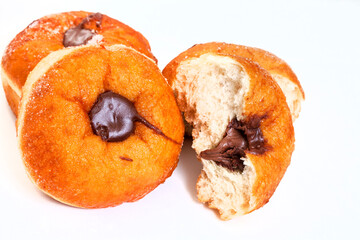 chocolate filled doughnut isolated on white