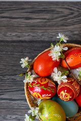 Traditional Easter table, easter eggs and flowers