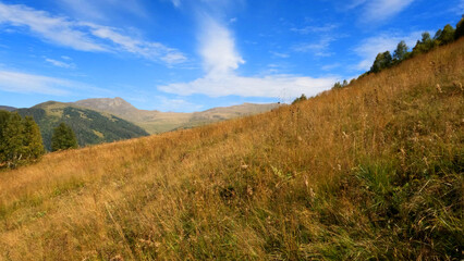Fototapeta na wymiar mountain landscape, view of Arkhyz mountains at autumn with blue sky - photo of nature