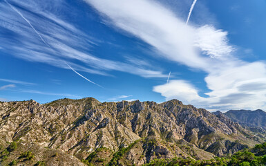 Mountain landscape with dramatic clouds in the Sierras de Tejada, Province of Malaga, Andlusia, Spain