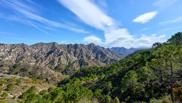 Mountain landscape with dramatic clouds in the Sierras de Tejada, Province of Malaga, Andlusia, Spain