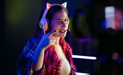Catch you later: Female gamer recording a vlog in front of a camera © Jacob Lund