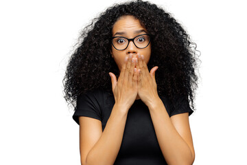 Photo of stupefied young female covers mouth, has bated breath, bugged eyes, Afro hair, cannot...