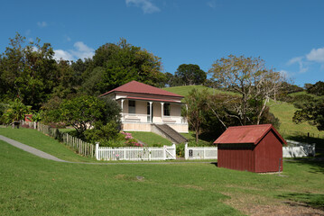 Fototapeta na wymiar Old, colonial style villa in a rural setting. Scandrett Regional Park, Auckland, New Zealand.