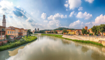 Amazing Verona cityscape view on the riverside with historical buildings and towers.