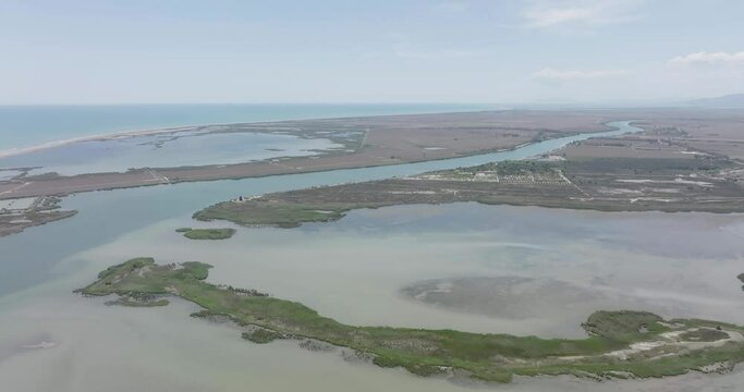 Delta de l'Ebre. Mouth of the Ebro River. Riumar, Tarragona. Natural park in Catalonia, Spain. Mediterranean sea. Flat color, log shot.