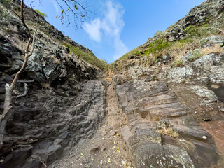 Footpath up Le Morne Brabant Mountain, UNESCO World Heritage Site basaltic mountain with a summit...