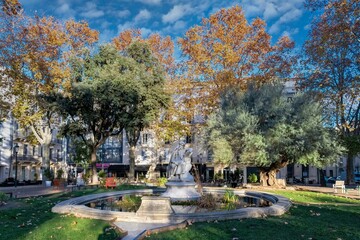 Beautiful wooded square in the historic centre of Nimes, France