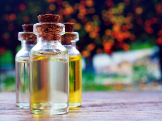Vegetable oils in glass bottles. Jojoba oil, castor oil, almond oil