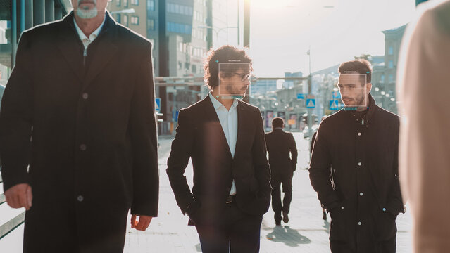 Crowd of Business People Tracked with Technology Walking on Busy City Streets. CCTV AI Facial Recognition Big Data Analysis Modern Interface Scanning, Displaying Personal Information.