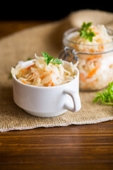 Sauerkraut with carrots and spices in a bowl