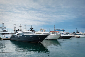 Fototapeta na wymiar Yachts and boats anchored in the port of Sochi. Russia
