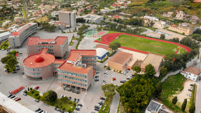 Aerial view of the Italian Air Force Academy in Pozzuoli, near Naples, Italy. It is a military school with an athletic field.