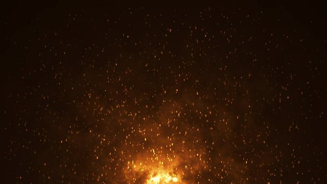 Burning hot bonfire fire sparks on a dark background.