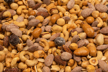 A group of almonds, pistachios, walnuts, macadamia, cashews.