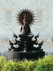 A beautiful Buddha idol statue in Wat Rong Khun White Temple, Chiang Rai, Thailand