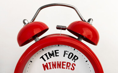 Red alarm clock with text Time For Winners