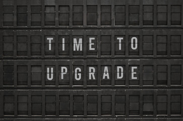 Flip board with text Time to upgrade