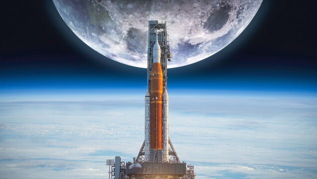 Spaceship on launch pad. Mission to Moon. Return on Moon. SLS space rocket. Orion spacecraft. Artemis space program to research solar system. Elements of this image furnished by NASA