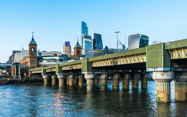 Cannon Street Railway Bridge ane Skyscrapers over River Thames, London, England