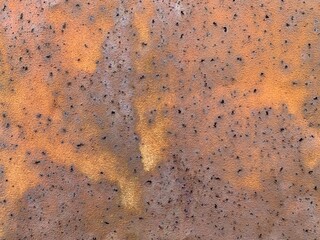 Old rusty metal texture. Grunge wall with rust stains background. Closeup.