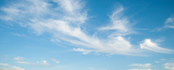 Naklejka na ściany i meble A clear blue sky with cloud