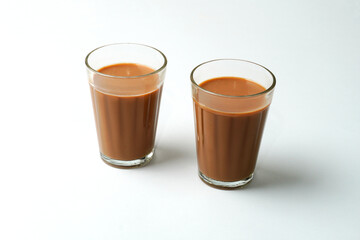 Karak Milk Chai famous indian tea on white background                          