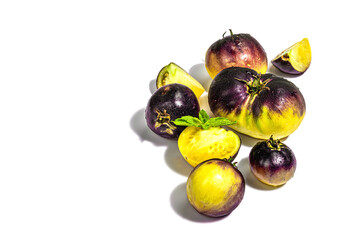 Yellow-violet Tomatoes variety Primary colors isolated on white background