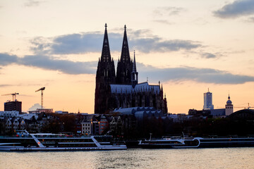 Sunset time. Cologne Dom and Rheine in Germany.
