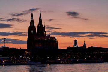 Sunset time. Cologne Dom and Rheine in Germany. - 594981558
