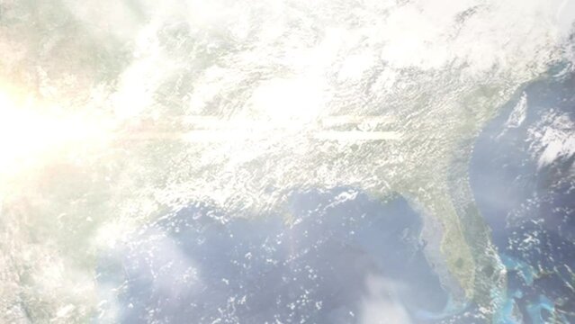 Earth zoom in from outer space to city. Zooming on Hattiesburg, Mississippi, USA. The animation continues by zoom out through clouds and atmosphere into space. Images from NASA
