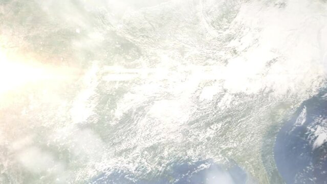 Earth zoom in from outer space to city. Zooming on Olive Branch, Mississippi, USA. The animation continues by zoom out through clouds and atmosphere into space. Images from NASA