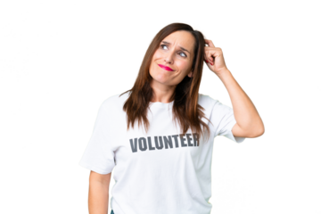 Middle age volunteer woman over isolated chroma key background having doubts and with confuse face expression