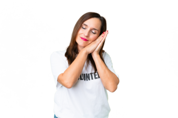 Middle age volunteer woman over isolated chroma key background making sleep gesture in dorable expression