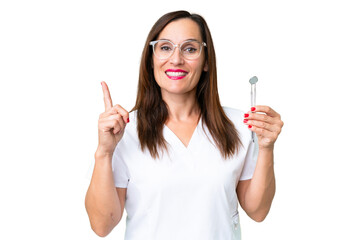 Dentist caucasian woman over isolated chroma key background pointing up a great idea
